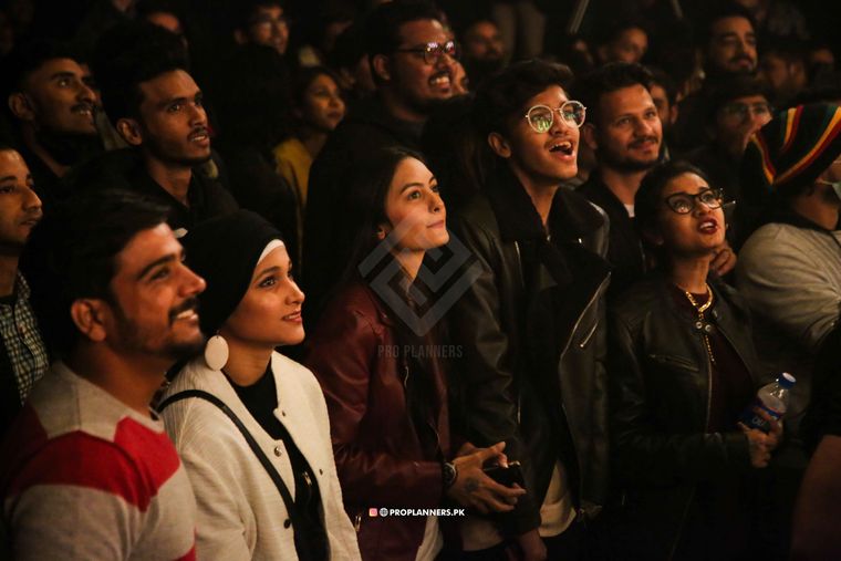 The crowd singing along